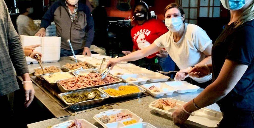 This photo accompanies an article about how to give back for Thanksgiving