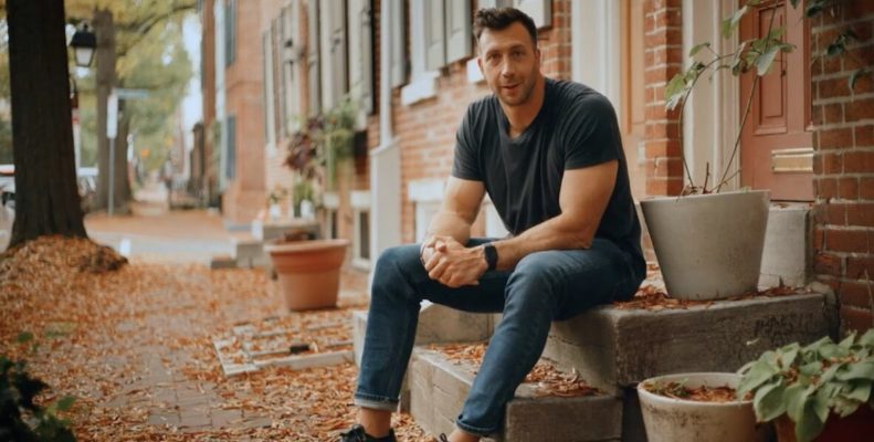 Former Eagle Connor Barwin sits on a stoop in Center City Philadelphia
