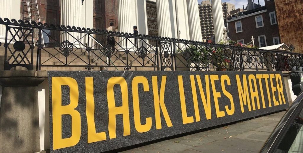 A 30-foot Black Lives Matter banner stretches across the front of St. Luke and the Epiphany in Philadelphia