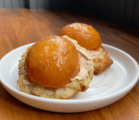 Tall Poppy Projects' "No Fuzz"—biscuit topped with toasted cream and preserved nectarines.