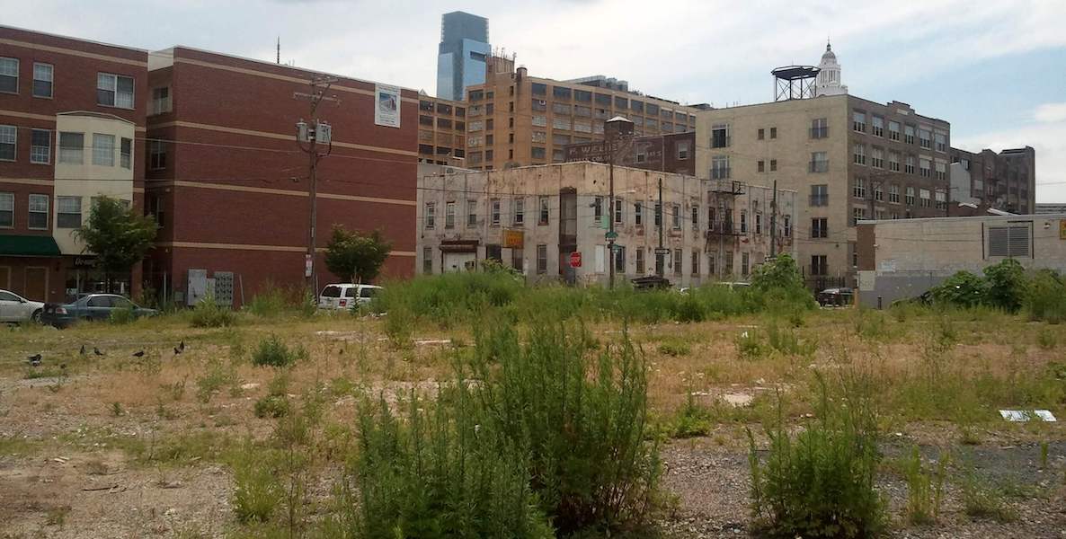 A vacant lot in the city of Philadelphia, within view of the Comcast building in Center City