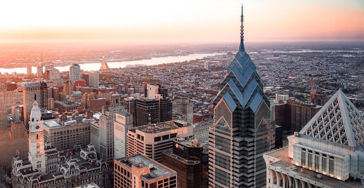 Comcast building, city hall and Philadelphia skyline at sunrise