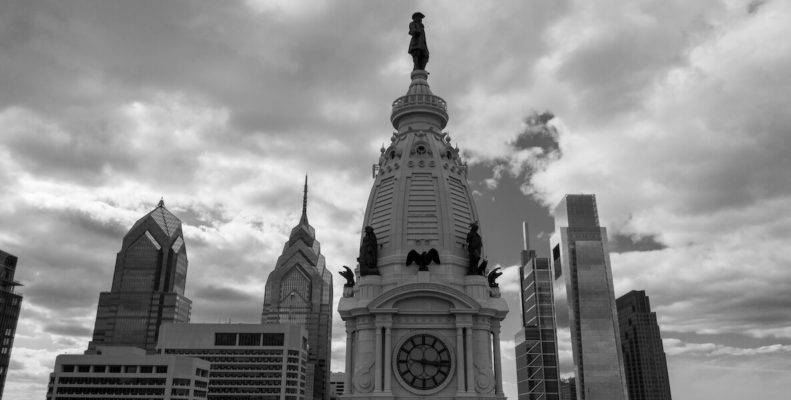 An ominous black and white picture of City Hall sets the tone for a podcast series about the gun violence epidemic in Philly