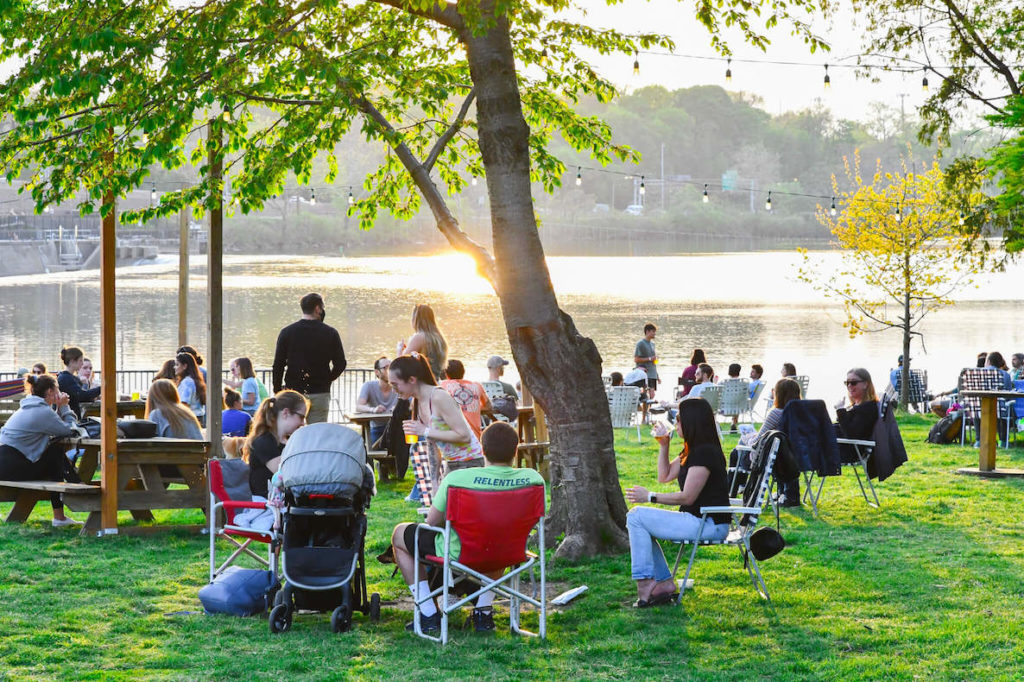 Guests enjoy food, beer and conversation at Parks on Tap along the Schuylkill River in Philadelphia