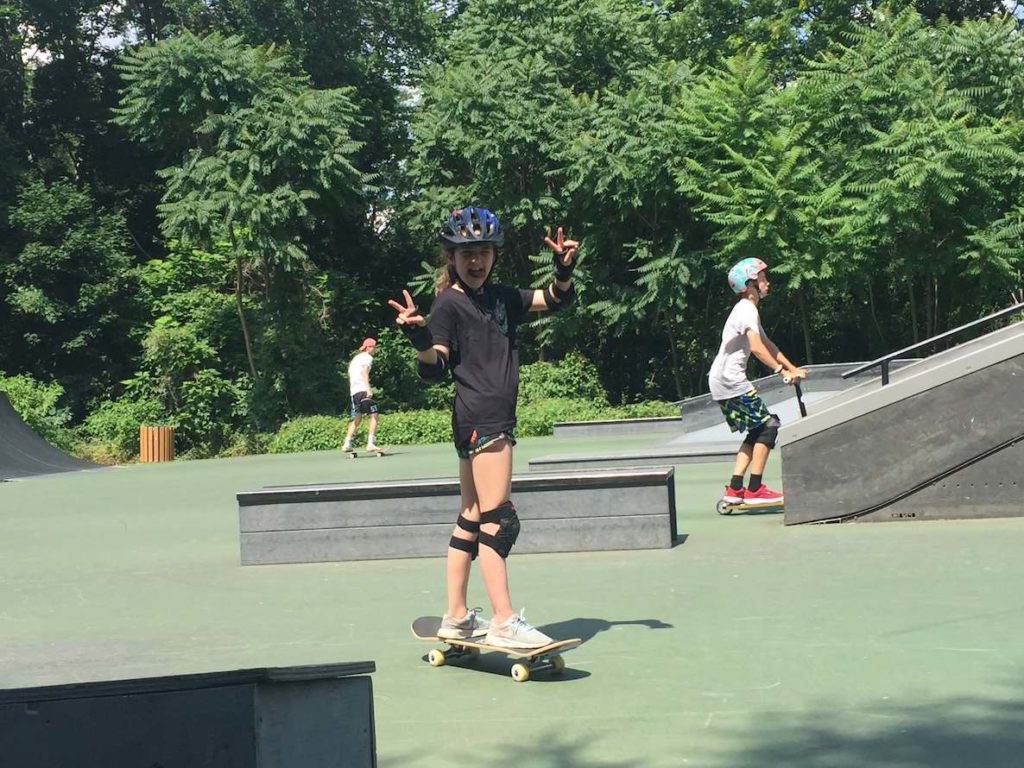 A young girl skates at a skate park near Philadelphia