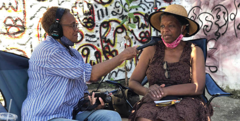 A woman from Germantown Info Hub interviews a Black woman about her life in Germantown
