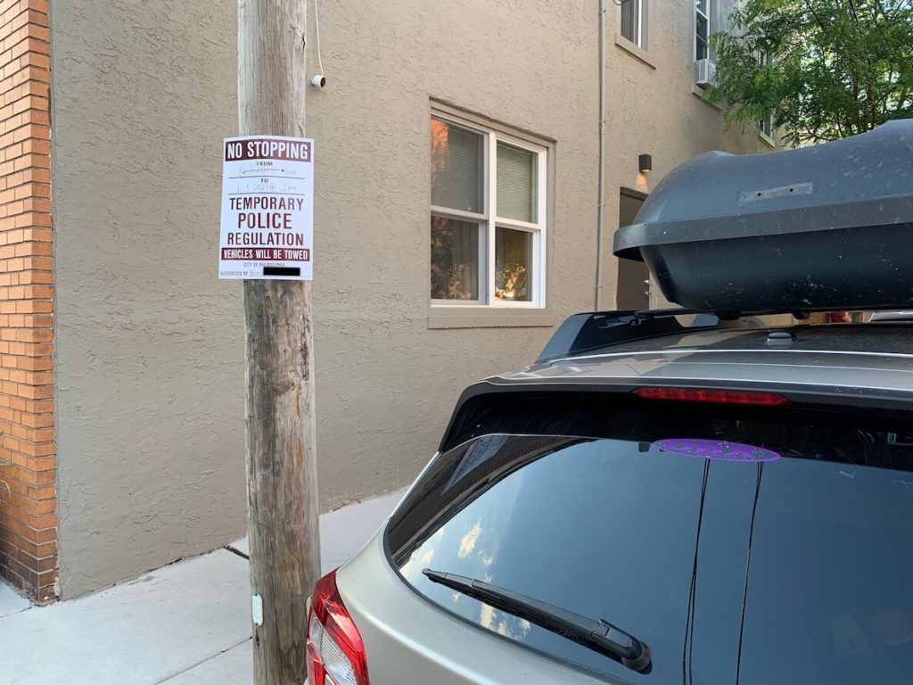 A No Stopping sign hangs on a light pole in South Philadelphia