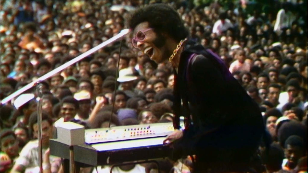 A scene from the documentary Summer of Soul featuring Sly of Sly and the Family Stone