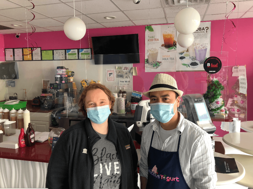 B-Local business owners wearing masks in bubble tea shop in Boston