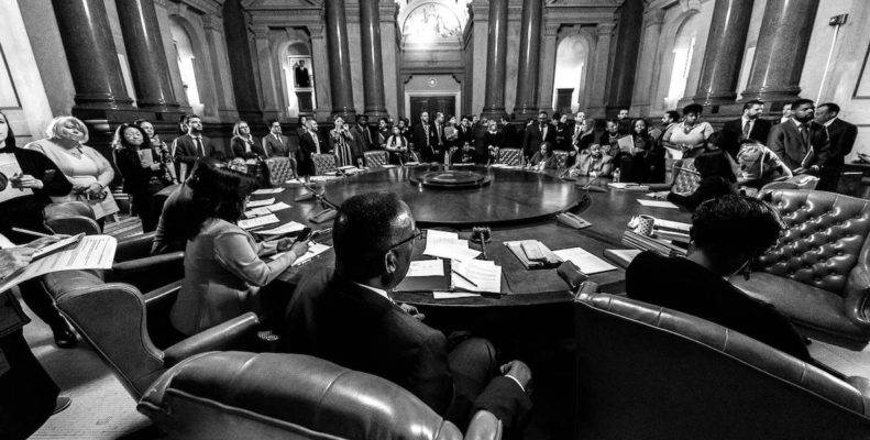 This black and white image shows a meeting of Philadelphia City Council within City Hall
