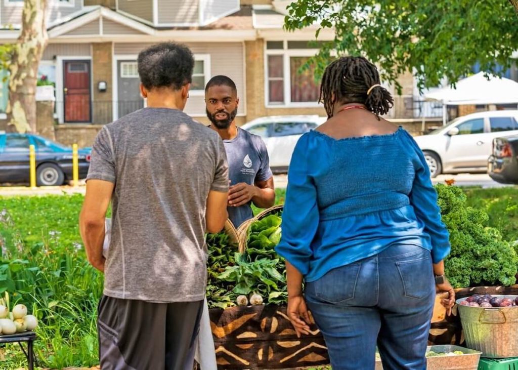 This photo accompanies an article about Khalil Steward, a Philadelphia man with a background in food justice work who started Farmacy, a food delivery service offering fresh produce grown by local Black and brown farmers to Philadelphians at affordable prices