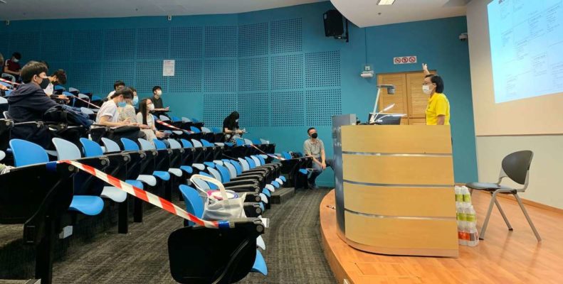 This photo of a university lecture hall during Covid accompanies an article about how universities should be open to reforming in the wake of Covid-19