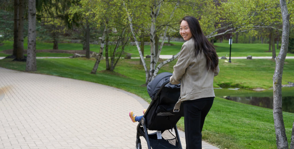Bo Zhao founder of Baby Gear Group pushing her baby in a stroller