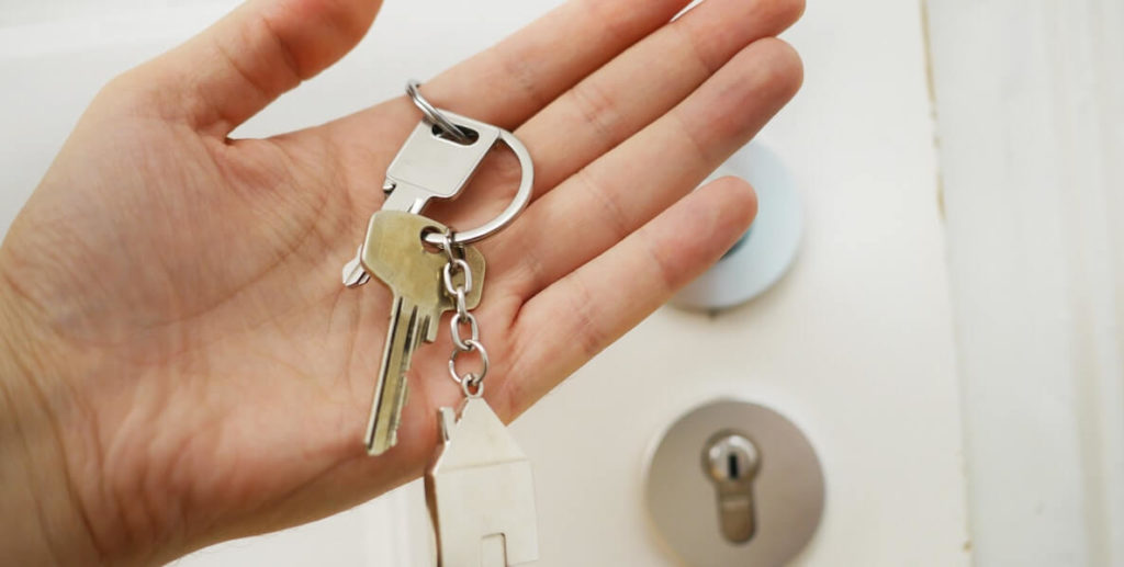 This photo of a hand holding keys accompanies an article about creating fairer housing policies in Philadelphia