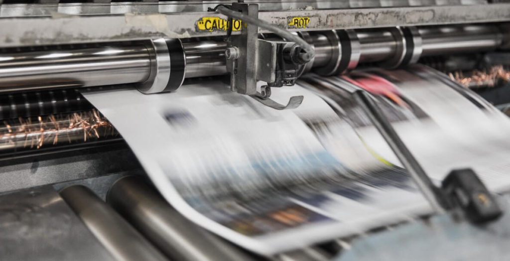 Action shot of Newspaper being printed