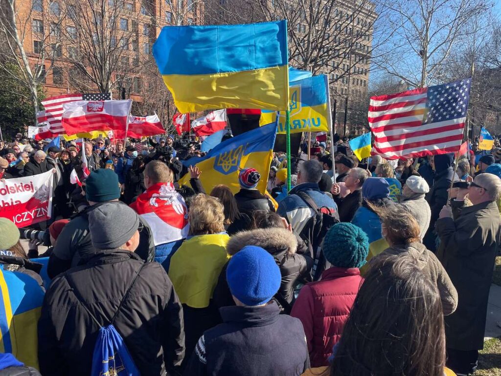 This photo of a rally supporting Ukraine in Philadelphia accompanies a list of ways to help Ukraine right now