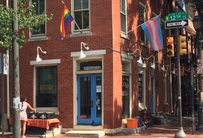 The brick exterior of Giovanni's room, one of the nation's oldest LGBTQIA+ bookstores, located on the corner of 12th and Pine streets in Philadelphia's Gayborhood.