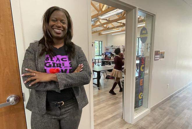 Atiyah Harmon, founder and executive director of Black Girls Love Math, stands outside a classroom at the St. James School in North Philadelphia.