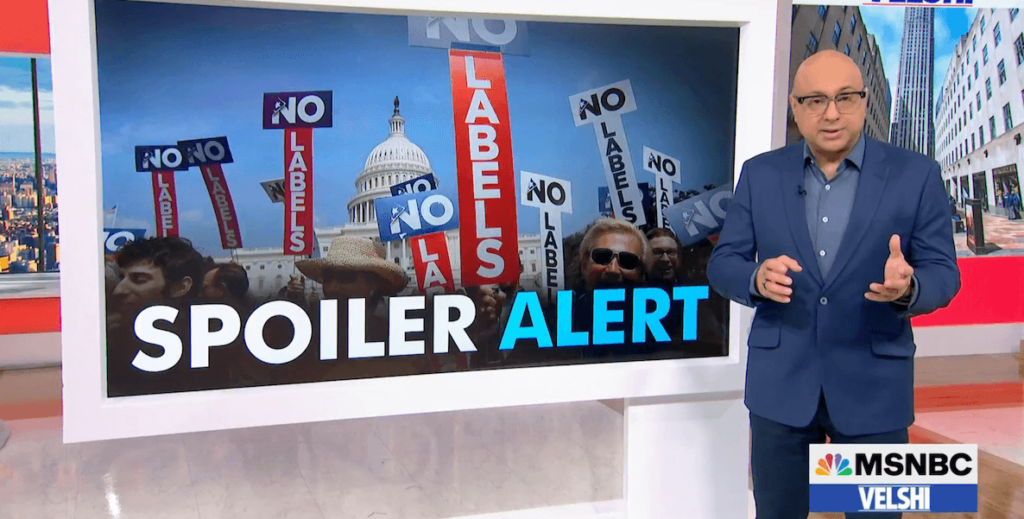 MSNBC anchor Ali Velshi stands by a screen reading "SPOILER ALERT" and picturing a crowd of people holding "No Labels" signs.