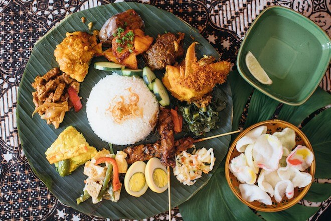 A plate of food, including rice, chicken and s hard-boiled egg, from Hardena, an Indonesian restaurant in Philadelphia.