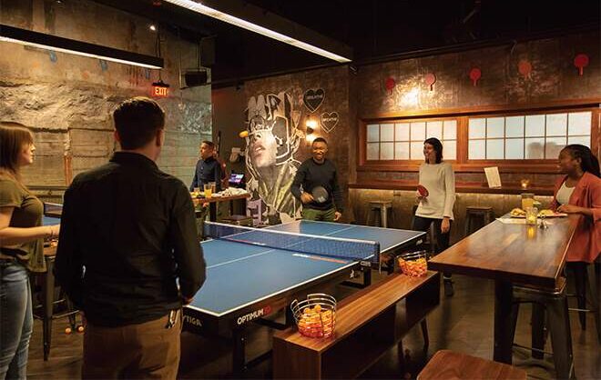 People play ping pong at SPIN Philadelphia.