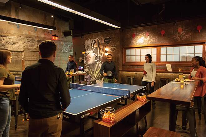 People play ping pong at SPIN Philadelphia.