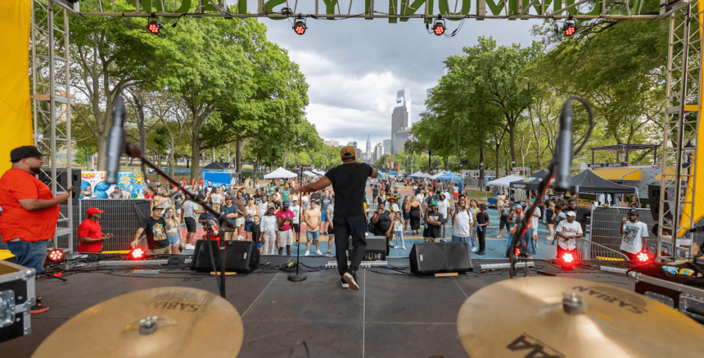 A scene from the stage at Hip Hop in the Park, and outdoor celebration of music, graffiti, breakdancing and more at Philly's Eakins Oval.