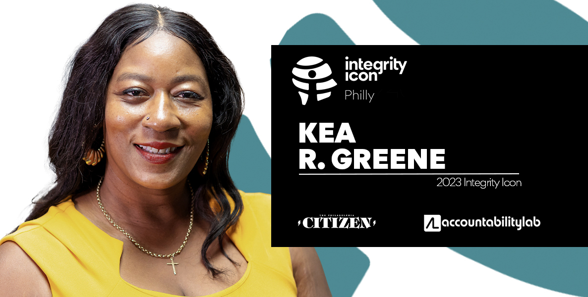 Integrity Icon Kea R. Greene, Communications and Community Engagement Manager in the Managing Director’s Office. Greene is a Black woman with long wavy hair wearing a yellow sleeveless outfit and smiling.