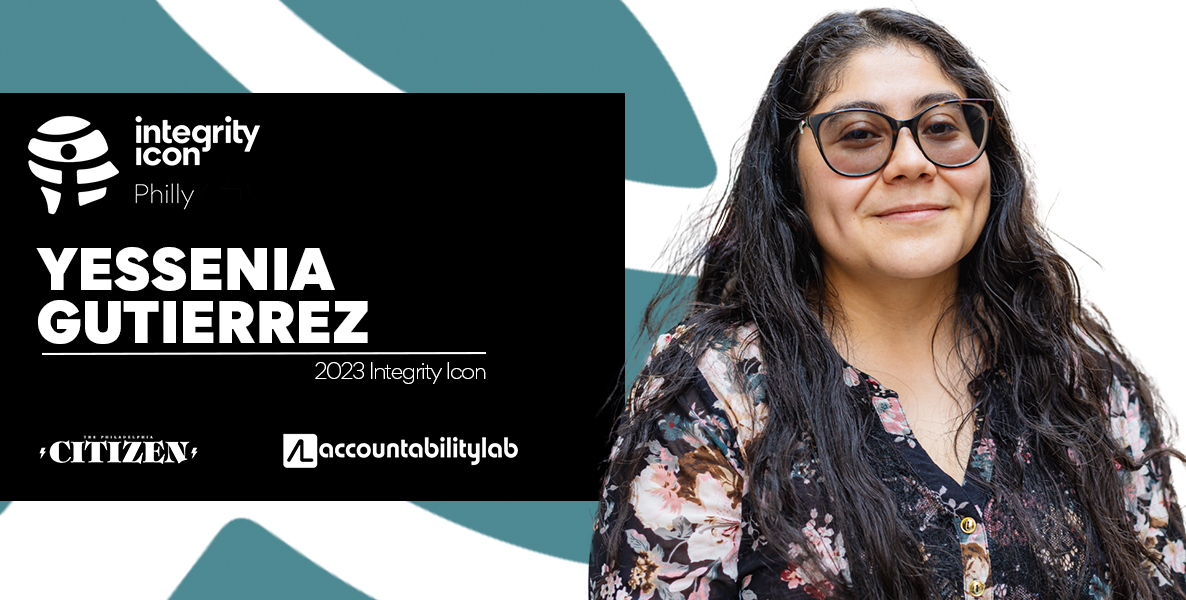 Integrity Icon Yessenia Gutierrez, an empathic, understanding member of the Office of Worker Protection’s department of labor. Gutierrez is a Latina woman with long wavy black hair, tinted glasses, wearing a floral blouse and smiling