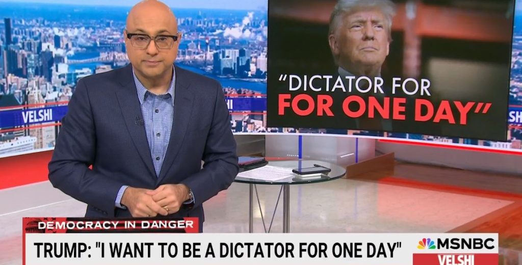 MSNBC Host Ali Velshi stands before an image of Trump labeling himself a dictator