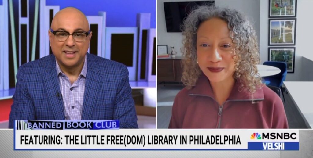 The man on the left, Ali Velshi, interviews the woman on the right, Angela Val, about how Little Freedom Libraries are making books by Black authors about Black Stories accessible