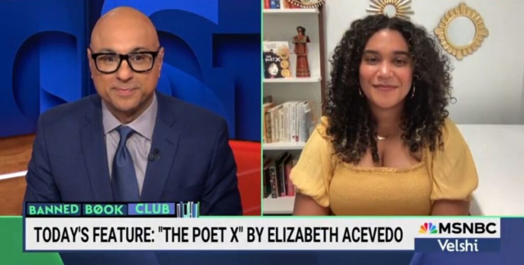 On the left sits the moderator Alli Velshi, a bald man with glasses, and on the right a Latin American woman with long dark hair, Elizabeth Acevedo, author of The Poet X.
