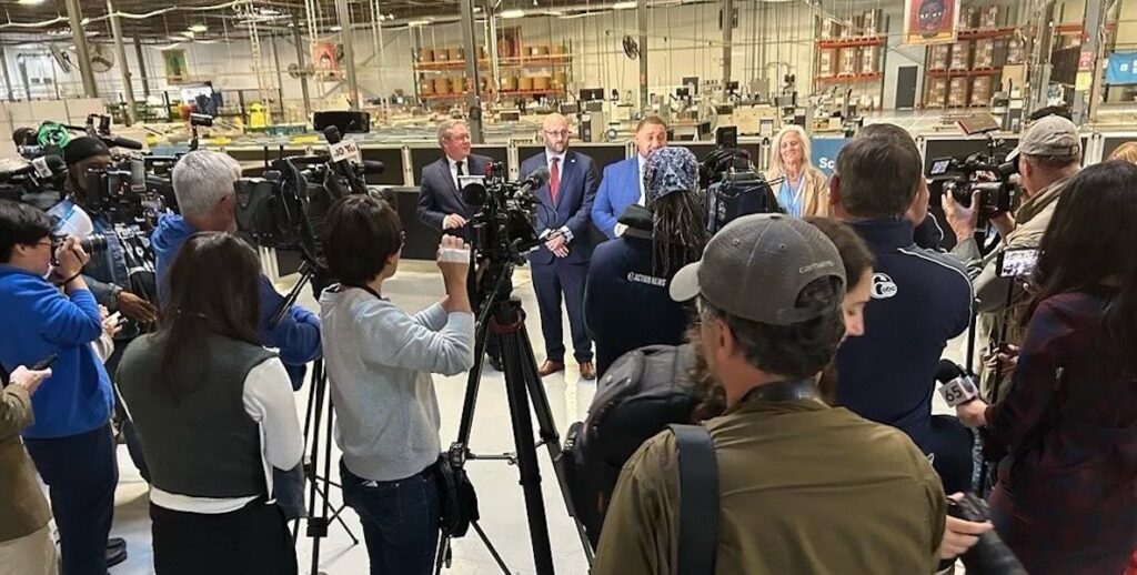 A press conference for City Commissioners, including, from second to left to right, Seth Bluestein, Omar Sabir and Lisa Deeley.