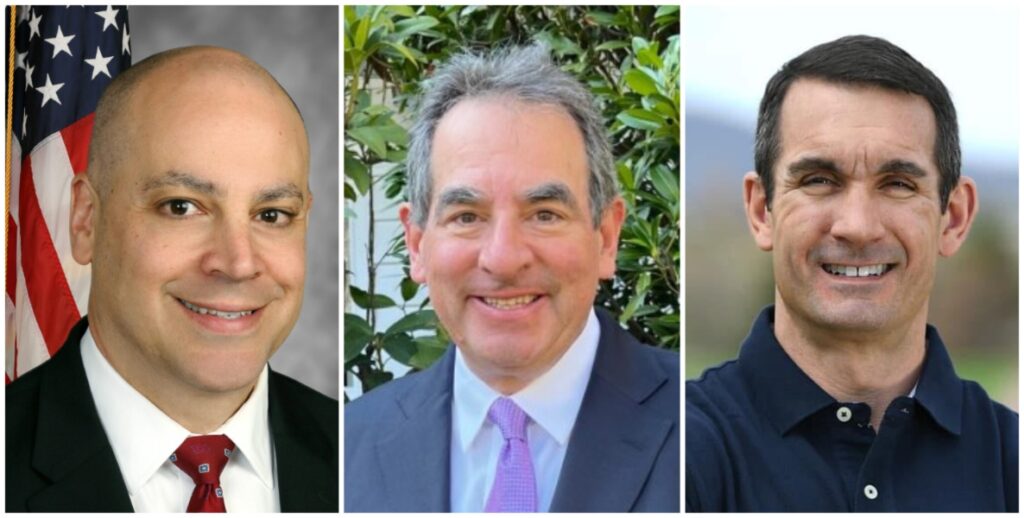 Headshots of three candidates for Attorney General of Pennsylvania. Dave Sunday is a bald white man wearing a suit jacket and tie and smiling with an American flag in the background. Eric Settle is a white man with grey hair wearing a suit jacket and tie with trees in the background. Eugene DePasquale is a white man with short dark hair wearing a dark collared shirt with mountains in the background.