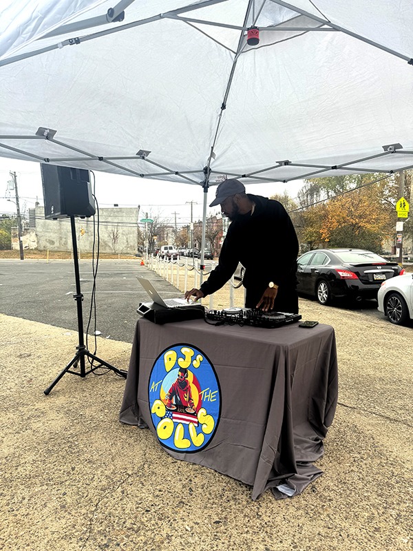 DJ Breezy with DJ at the Polls in Strawberry Mansion. By Olivia Kram.