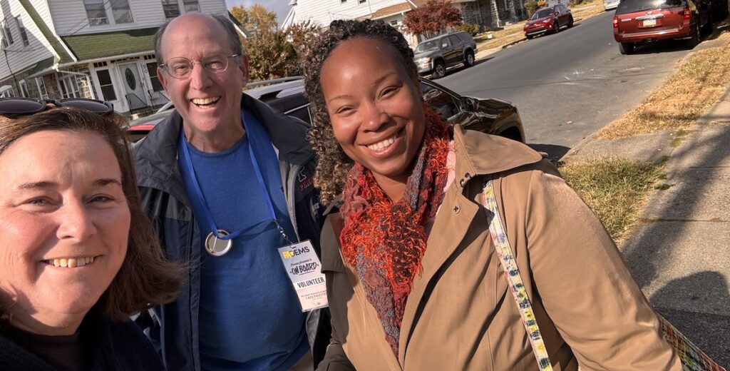 Left to right: Dawn Friedkin, Ken Weinstein, and a passerby who wanted to let them know she's already cast her vote.