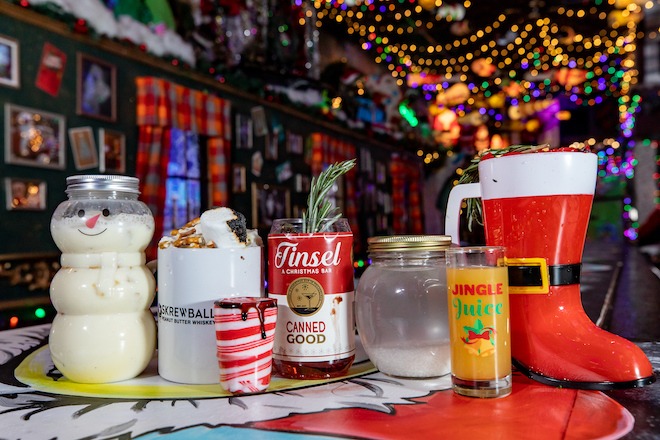 Holiday cocktails come in a snowman jar, can that resembles Campbell's soup, candy cane shot glass, Santa Claus boot at Tinsel, an over-the-top holiday pop-up bar in Philadelphia. 