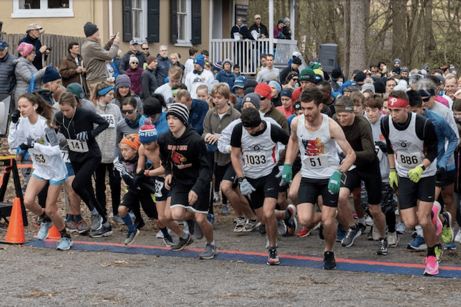 A group of runners prepare to begin the PHLY Turkey Trot in the Wissahickon section of Fairmount Park in Philadelphia 