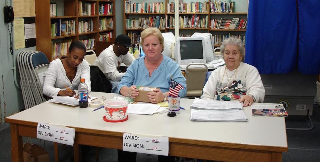 Poll workers for Philadelphia's 62nd Ward, 4th Division, in the library of the Smedley School in Philadelphia.