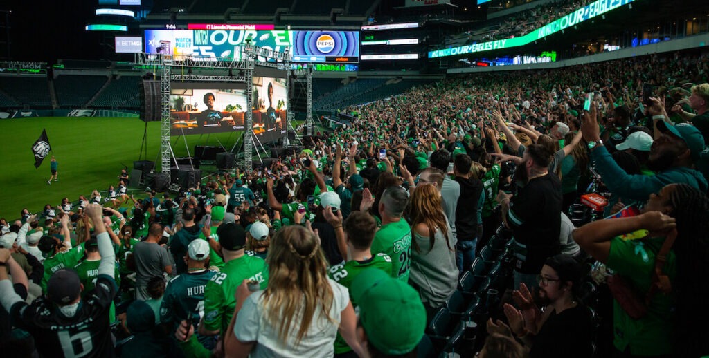 A crowd of Eagles fans, many wearing Eagles gear, fill half of Lincoln Financial Field to watch the Eagles-Packers game in São Paulo, Brazil on September 6, 2024.