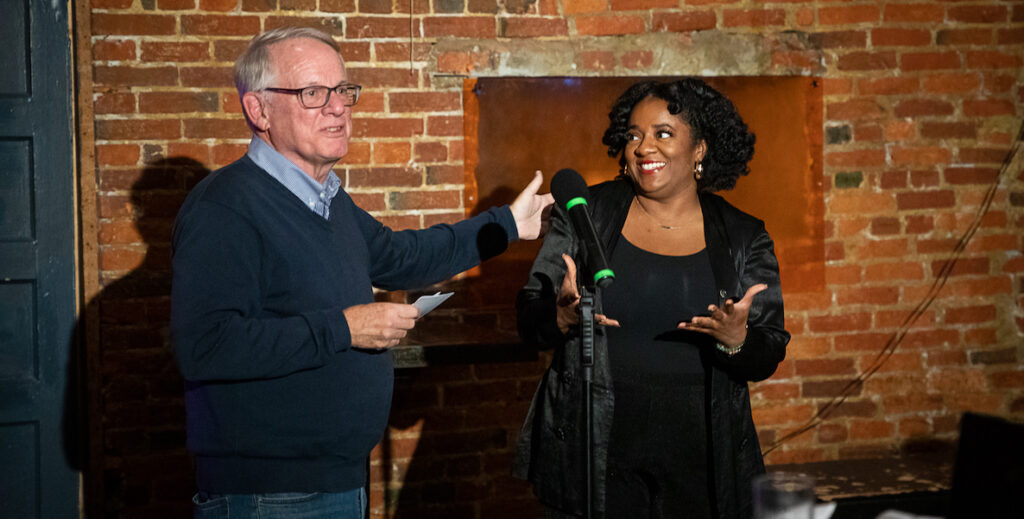 MISSION Story Slam 9 winner Trenae Nuri (right) and host Christ Satullo.